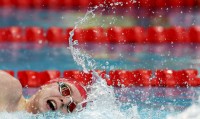 爱游戏-南非选手在游泳比赛中获得多枚奖牌,表现稳定